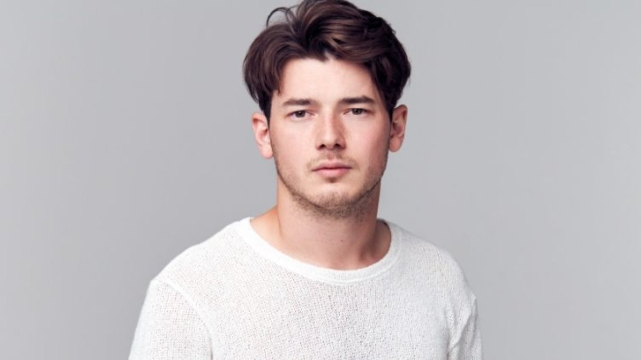 demo attachment 1568 studio portrait of young man with serious 8ysppqm